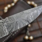 Custom Damascus Folding Knife with Handmade Leather Pouch - Image 3